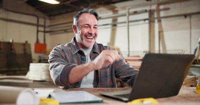 Man, fist pump and carpenter in workshop with laptop for research on furniture manufacturing. Computer, good news and mature woodworker with email for order confirmation with contact in warehouse.