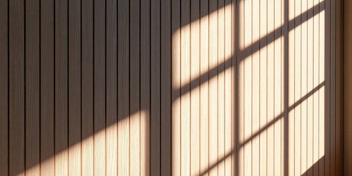 Warm sunlight casts grid shadows across a smooth, vertical wood-paneled wall