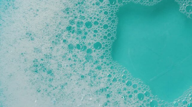 soap foam isolated on black background, detailed bubble texture for cleaning