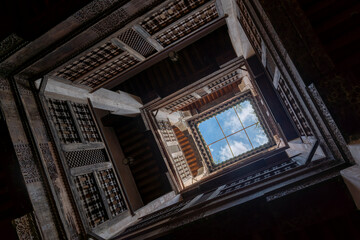 Looking Up at the Carved Wooden Gallery of the Medersa Cherratine, Fes, Morocco © GuillaumeAngleraud
