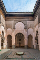 Fototapeta premium Wider Courtyard View with a Fountain at the Medersa Cherratine, Fes, Morocco