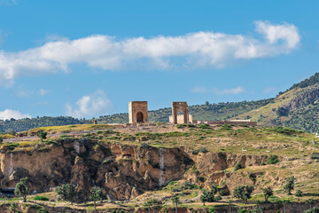 Fototapeta premium Marinid Tombs on a Rocky Hilltop Seen from the Heights, Fes, Morocco