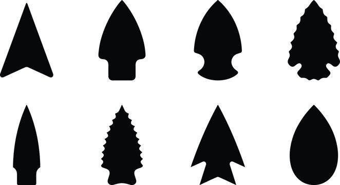 Collection of ancient arrowhead silhouettes featuring native American stone spearheads flint weapon points isolated on white background