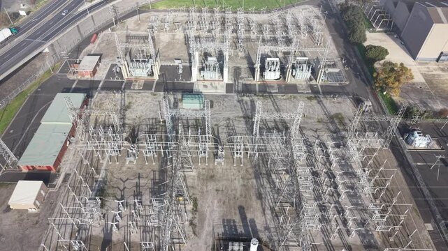 Electrical substation power grid and transformers aerial view