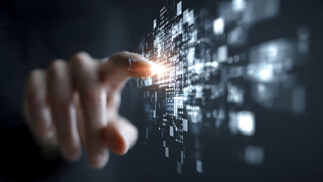 Close-up of a person's finger touching a glowing digital interface of abstract geometric shapes representing data and technology.