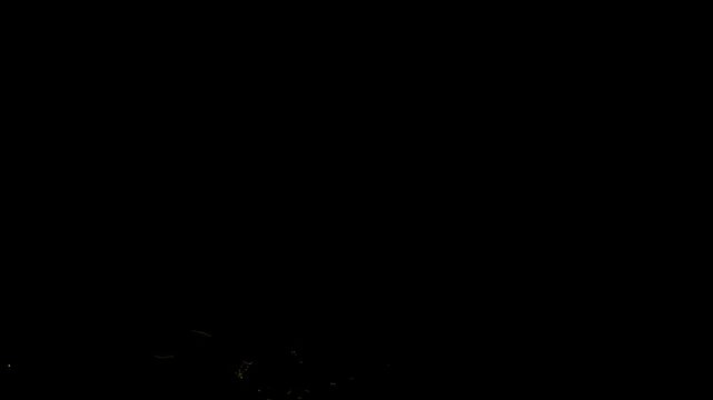 Shimmering golden particle magic corner frame trail with bright light flare on black background for cinematic video transitions and effects