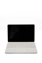 Fototapeta premium Minimal white laptop isolated on a light background