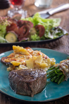 steak with potato gratin
