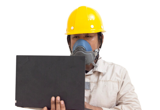 11 july 2026 Industrial engineer wearing safety helmet and respirator mask working with computer