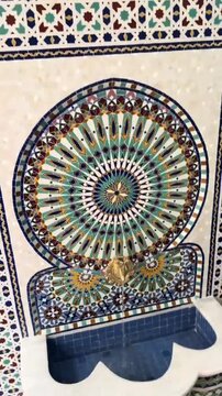 Traditional Moroccan Zellige Fountain with Handmade Islamic Mosaic Tiles in Fez Medina, Authentic Moroccan Craftsmanship and Decorative Architecture