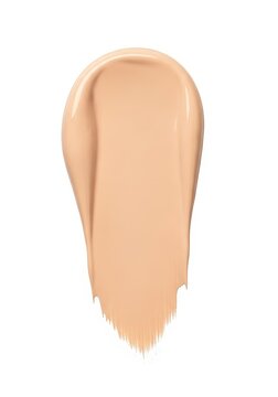 A smooth, creamy swatch of light beige cosmetic foundation makeup photographed on a clean, bright white background for beauty concepts, liquid, smear, pigment
