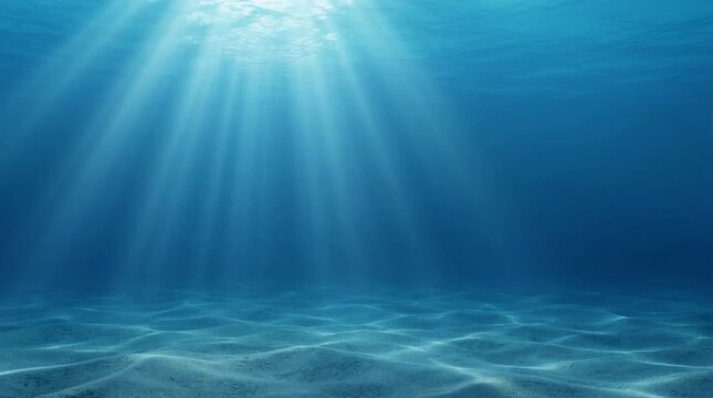 Underwater blue ocean seascape with sunlight rays over sandy seafloor and clear water, serene calm sea scene with sunbeam light and tranquil blue seabed