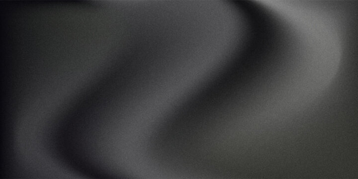 Sandblasted or brushed titanium or steel metal surface  the light reflection of the curved lines creates a smooth gradation on the dark black metallic background