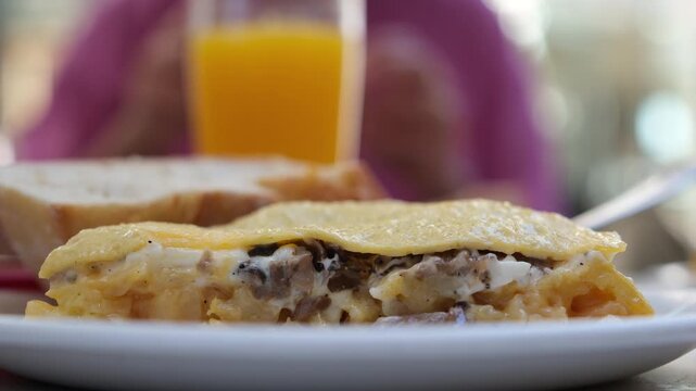 Close-up of traditional Spanish tortilla de patatas with mushrooms in a caf&eacute; in Santander, Spain. Shallow depth of field.