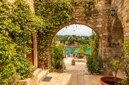Stone archway in Ulcinj old town overlooking Adriatic Sea, Montenegro