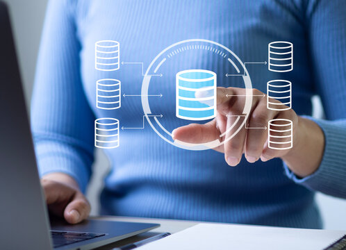 Business professionals utilize business data analytics systems on laptop computers, emphasizing the concept of data and process integration.