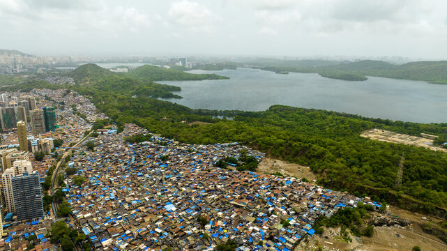 Dense residential settlement near mangroves in Mumbai India drone view