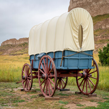replica of pioneer covered wagon on prairie in Scotts Bluff National Monument, Nebraska