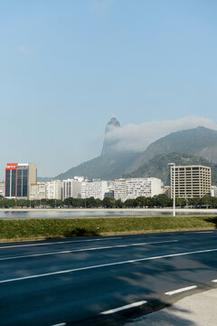 Christ the Redeemer Above City Skyline