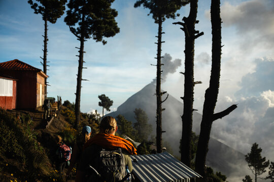 Hikers walking through campsite on Acatenango volcano