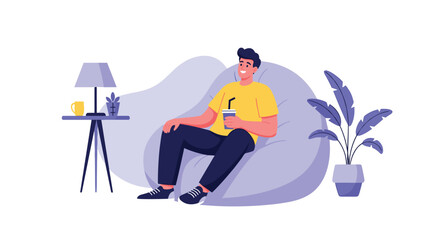 Obraz premium Smiling young man relaxing on a comfortable purple beanbag chair and holding cup with straw in cozy room.