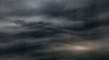 Fototapeta premium Moody storm clouds over dark ocean, dramatic monochrome seascape, atmospheric abstract sky background for nature design