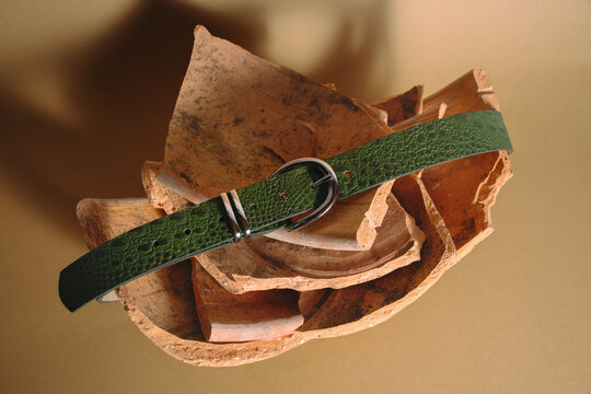 Leather Belt Holding Together Broken Terracotta Pot