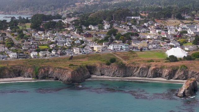 Take in the sights of Mendocino California with aerial views of the coastline and the tent for the music festival in the village
