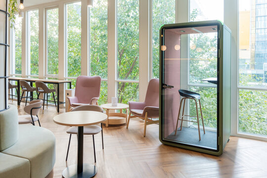 Modern Workspace Booth in a Bright Office Setting