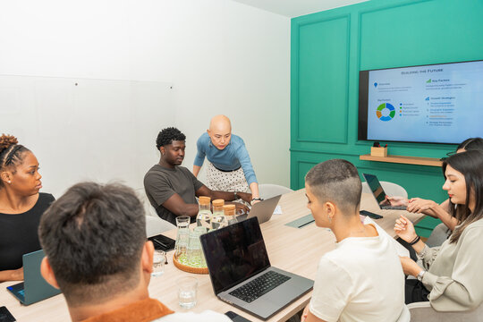 Team Discusses Project Plans in an Office Meeting Room