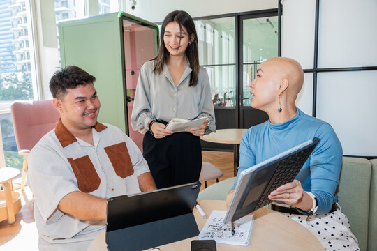 Team Collaboration in a Modern Workspace During the Daytime