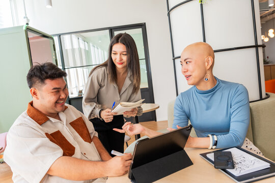 Team Members Discuss Ideas in a Modern Office Setting