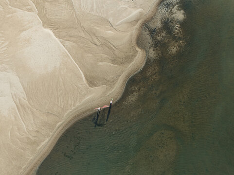 Fishermen in Shallow Water