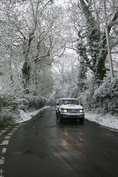 Winter Driving Conditions On Snowy Rural Road