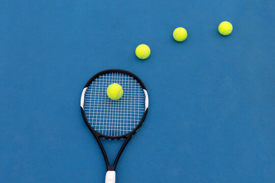 Tennis Racket with Ball on Strings and Three Balls in a Row