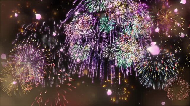 Fireworks illuminate the night sky with vibrant purple and gold explosions amidst falling cherry blossom petals.