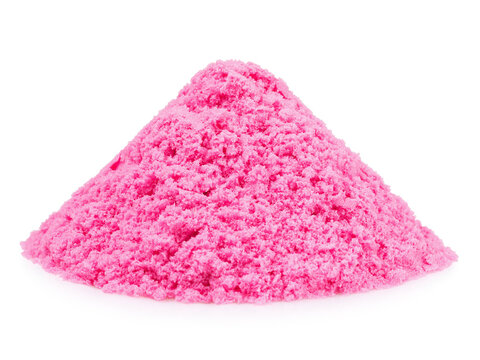 A pile of pink kinetic sand with a grainy texture, isolated on a white background