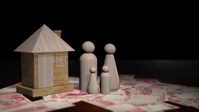 Wooden family figures and a house model sitting on chinese yuan renminbi banknotes with a rotating camera shot.