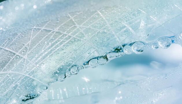 Macro blue abstract netting with water drops 水滴と青いネットのテクスチャ背景素材