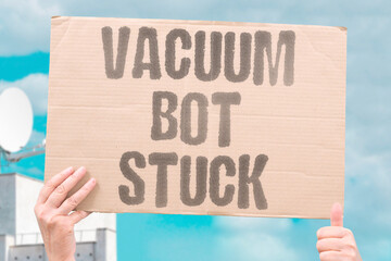 "Vacuum Bot Stuck" Robot cleaner trapped under sofa. VACUUM. BOT. STUCK. CLEANER. SOFA. © AndriiKoval
