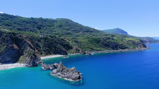 Aerial view of rock of the ulivarella, Tonnara di Palmi, Calabria, Italy. Slow motion