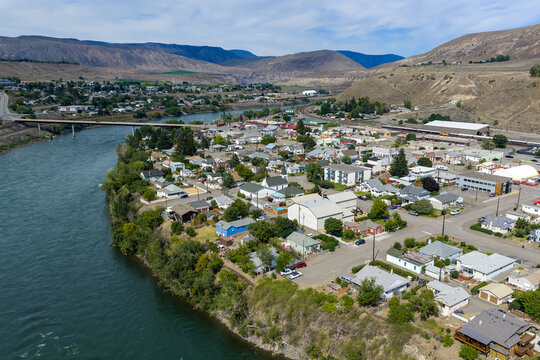 Aerial View of Ashcroft Small Town Along the Thompson River With Bridge and Arid Mountains, British Columbia
