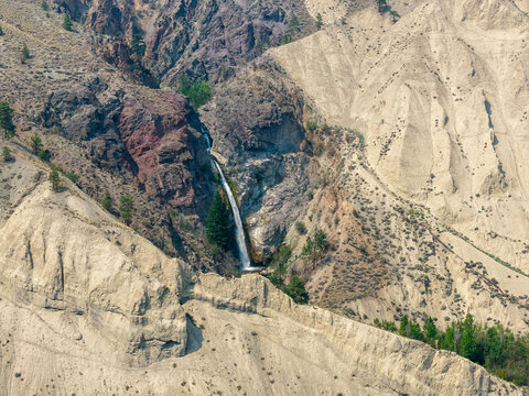 Waterfall Cascading Through Arid Cliff Canyon Above Thompson River Near Spences Bridge British Columbia Canada