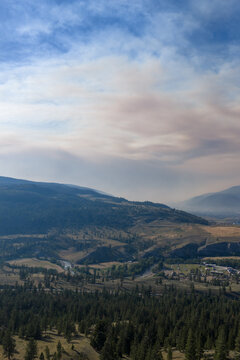 Misty Mountain Valley With Forest Fire Smoke Over Merritt, British Columbia, Canada Landscape