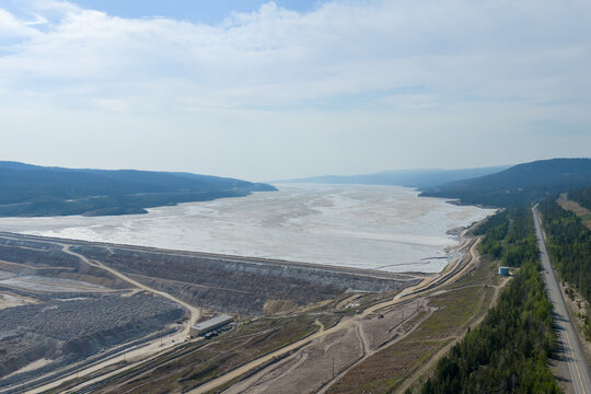 Aerial View of Mining Tailings Pond and Industrial Landscape Along Highway in British Columbia, Canada