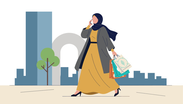 Elegant young Muslim woman wearing hijab and long coat walking in city center while holding shopping bags.