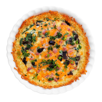 Breakfast quiche with ham, mushrooms, and onions made in a hash brown shell. Top down view isolated on a white background.