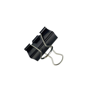 Single black metal binder clip used for organizing documents and paper isolated