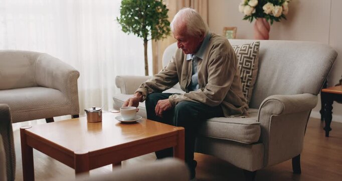 Senior, man and drinking tea in retirement home with thinking, contemplation or nervous for decision. Anxious, old person and warm beverage in living room with reflection, regret past or bad memories