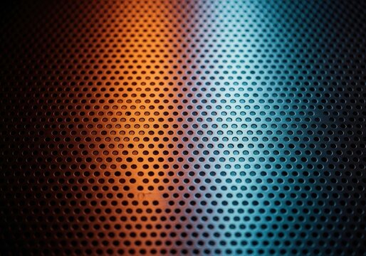 A close-up view of an abstract metal sheet background featuring a regular pattern of small, circular indentations or dots, creating a perforated texture, grid, background, gray